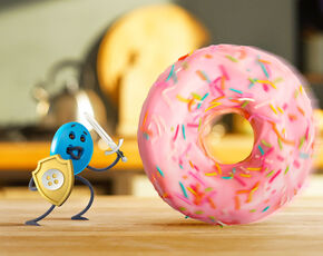 Gombík KetoDiet vs skrytých cukrov a trans tukov plný ružový donut. Vysporiadajte sa so zabijakmi diéty